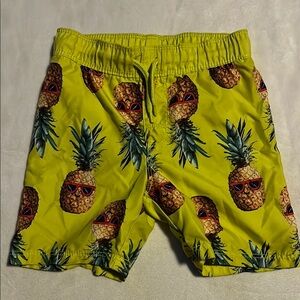Old Navy Vibrant Yellow and Green Swim Trunks with Edgy Tropical Design
